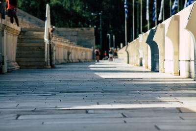 Footpath amidst buildings in city