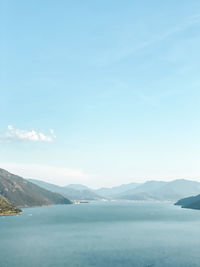 Scenic view of sea against blue sky