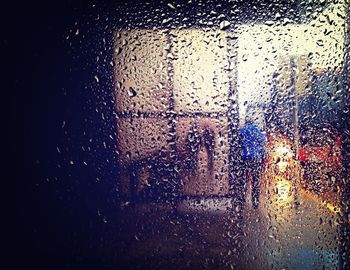 Close-up of water drops on glass window