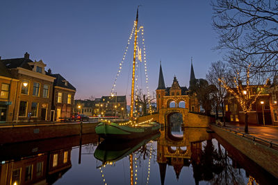 Decorated traditional sailing ship in sneek in the netherlands in christmas time at night