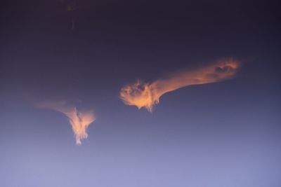 Low angle view of fire in sky at night