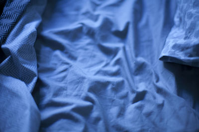 Full frame shot of crumpled sheet on bed