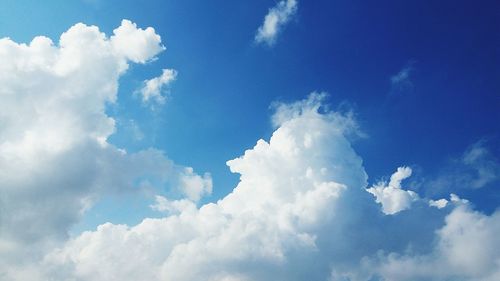 Low angle view of clouds in blue sky