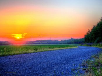 Scenic view of landscape at sunset