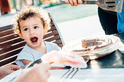 Portrait of cute boy holding ice cream