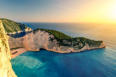 Panoramic view of sea against sky during sunset