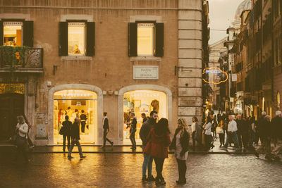 Woman standing in front of building