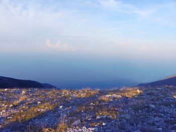 Scenic view of mountains against sky during winter