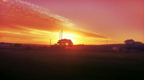 Scenic view of landscape at sunset