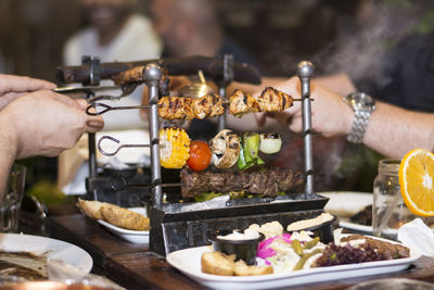 Midsection of person preparing food