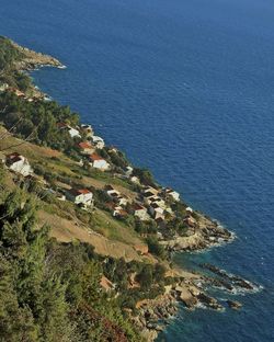 High angle view of sea and buildings