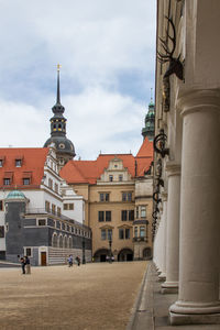 Buildings in city against sky