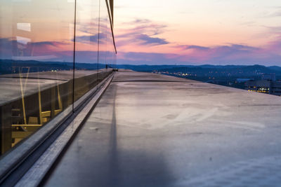 Scenic view of sunset seen through window