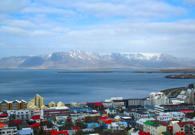 Scenic view of mountains against cloudy sky