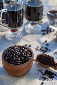 Still life with coffee beans, wooden spoon, making coffee at home