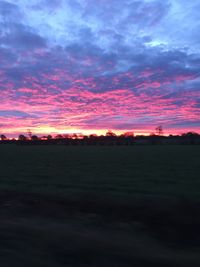 Scenic view of dramatic sky during sunset