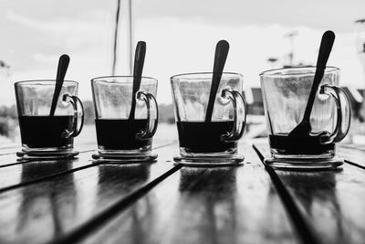 Close-up of glasses on table