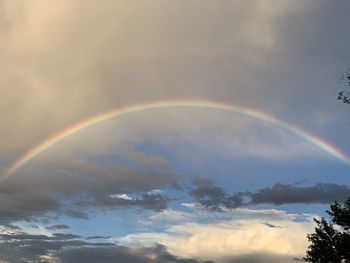 Low angle view of rainbow in sky