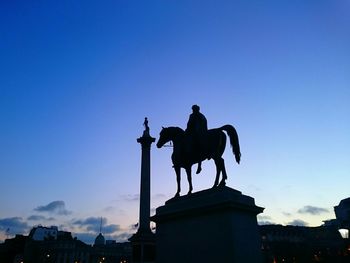 Low angle view of statue against clear sky