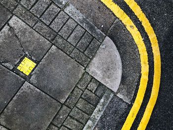 High angle view of arrow symbol on road