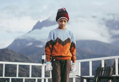 Portrait of girl standing in snow