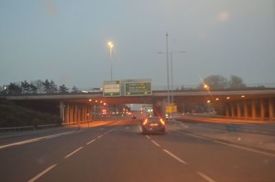 Cars on road at night