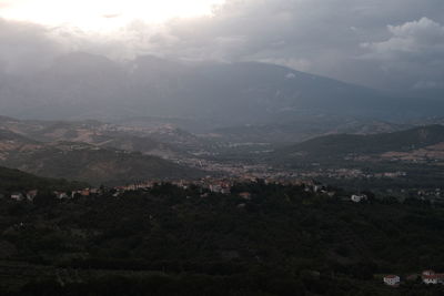 High angle view of illuminated mountains against sky