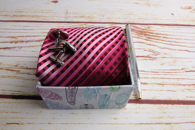 Close-up of necktie on table