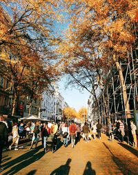 People on street in city during autumn
