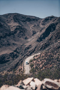 Aerial view of mountain road against sky