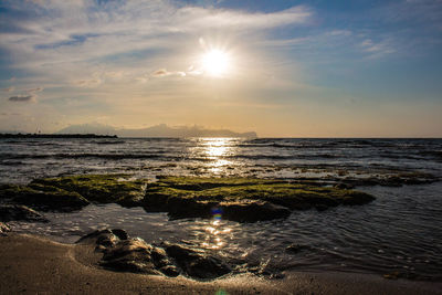 Scenic view of sea against sky during sunset