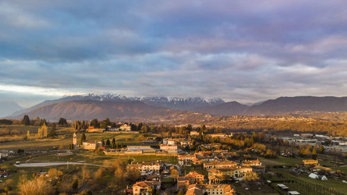 Aerial view of townscape against sky