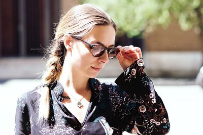 Young woman wearing sunglasses