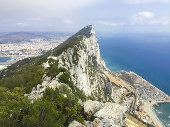 High angle view of bay and sea against sky