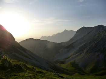 Scenic view of mountains against sky during sunset