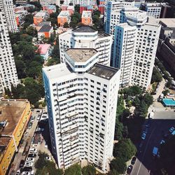 High angle view of buildings and street in city