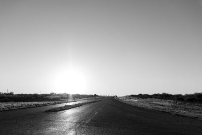 Road against clear sky