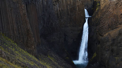 Scenic view of waterfall in forest