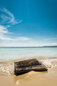 Scenic view of sea against blue sky