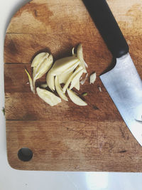 High angle view of chopped cutting board on table