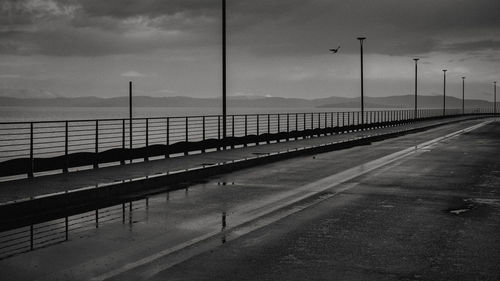 Pier over sea against sky