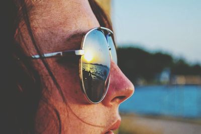 Close-up of woman wearing sunglasses