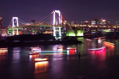 Illuminated view of tokyo bay and rainbow  bridge at night