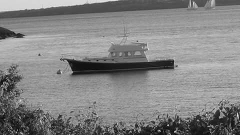 nautical vessel, boat, transportation, water, mode of transport, moored, tranquil scene, sea, tranquility, nature, lake, scenics, beauty in nature, travel, beach, rowboat, day, outdoors, sky, lakeshore