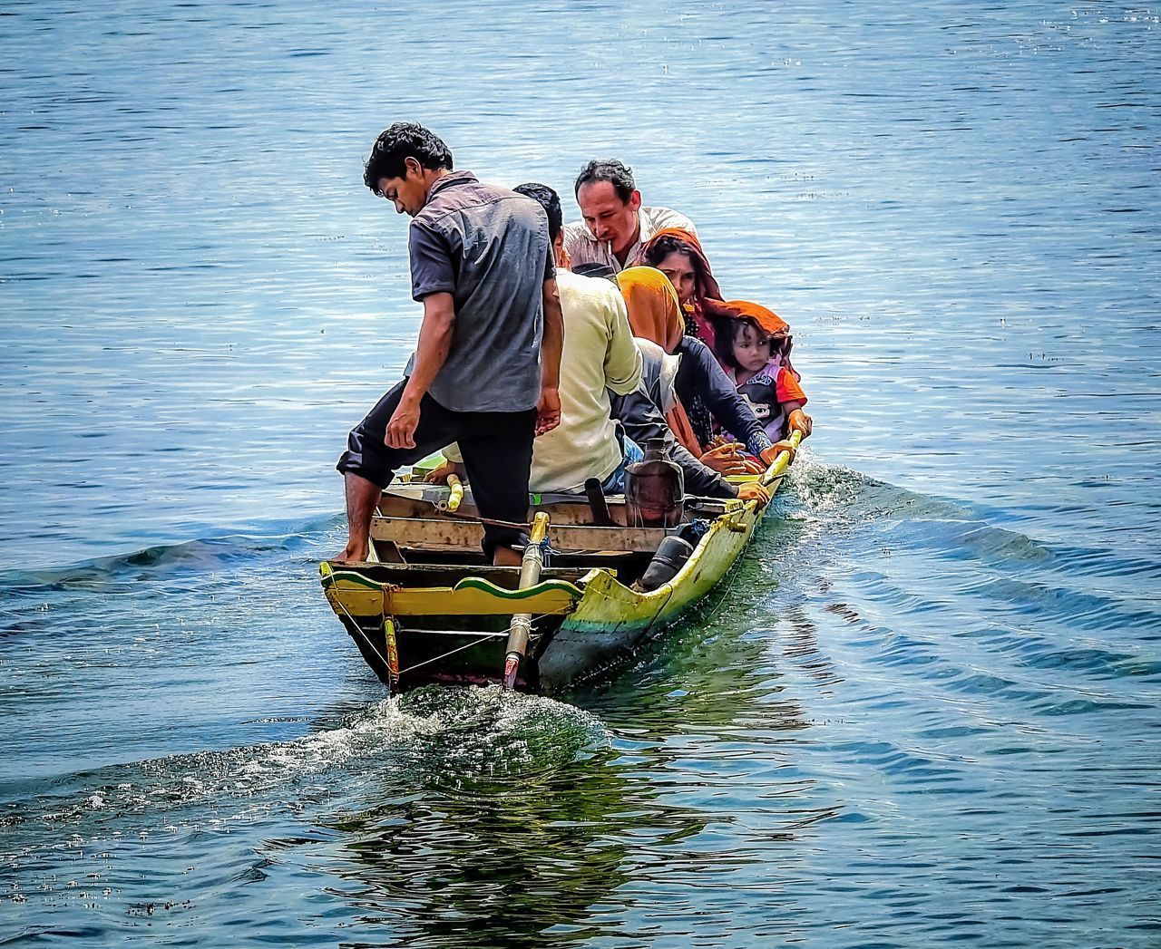 FULL LENGTH OF PEOPLE ON LAKE