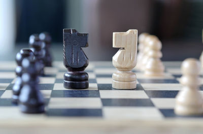 Close-up of chess pieces on board