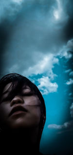 Portrait of woman against sky