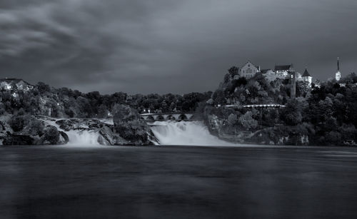 Long exposure photograph of the rhein falls with the laufen castle on the background.