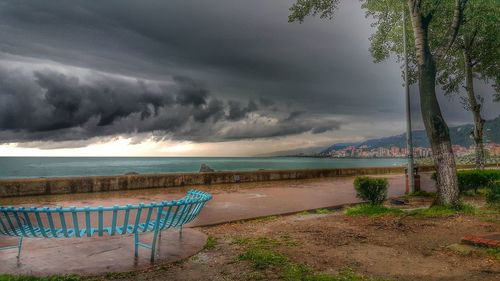 Scenic view of sea against cloudy sky