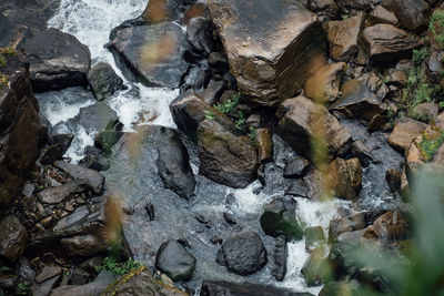 Close-up of water flowing through rocks